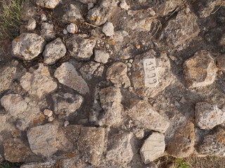stones on the pavement different form  numbers