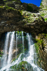 Fototapeta na wymiar The Gega waterfall. The most famous and largest waterfall in Abkhazia. Georgia.