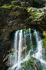Fototapeta na wymiar The Gega waterfall. The most famous and largest waterfall in Abkhazia. Georgia.