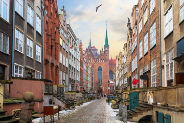 Fototapeta na wymiar Famous street of Gdansk, Mariacka street, view on St Mary's Church, Poland