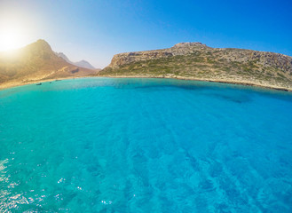 Balos, Crete island, Greece. Fisheye view on the beautiful  crystal clear water and rock.