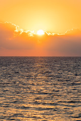 Colorful dawn over the sea, Sunset. Beautiful magic sunset over the sea. vertical photo.