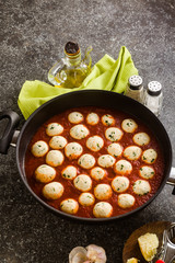 cheese veggie ricotta meatballs in tomato sauce in a pan. traditional Italian cuisine for the whole family, party or restaurant menu