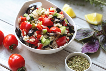 Barley Noodles Salad with vegetables and olives