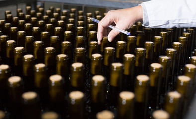 wine bottles with stoppers on modern winery