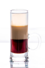 shots of colored layers of different alcohol