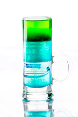 shots of colored layers of different alcohol