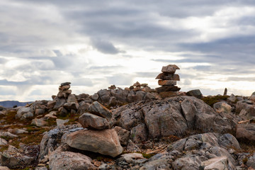 Pile of Rocks on the Atlantic Ocean Coast during a cloudy evening. Taken in Newfoundland, Canada.