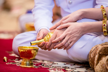 libation, Thai engagement, pour water in Thai wedding, pouring water in Thai wedding