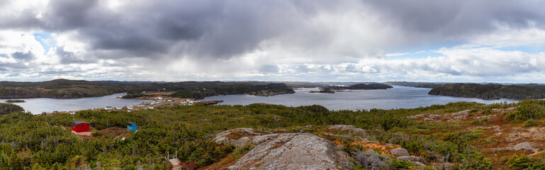 Panoramic View of a Canadian Landscape on the Atlantic Ocean Coast during a cloudy morning. Taken in Pikes Arm, Newfoundland and Labrador, Canada.