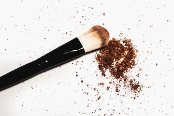 Makeup brushe with blusher  on white background.