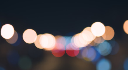 Night city bokeh light abstract background, blurred blue flare lens