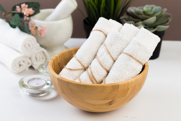 Spa still life with aromatic candles, flower and towel. - Image.
