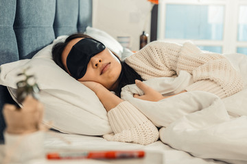 Close up of young beautiful woman feeling good while sleeping