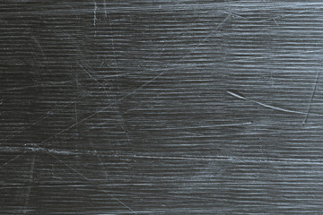scratches on the sliding surface of the snowboard close-up