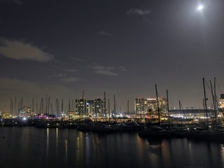 Fototapeta na wymiar Yachts in marina at night (Herzliya Marina at night )