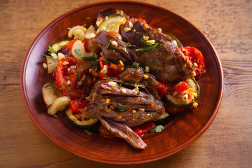Slow cooker lamb with tomatoes, zucchini, eggplant, onion and garlic. horizontal