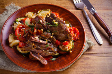 Slow cooker lamb with tomatoes, zucchini, eggplant, onion and garlic. horizontal