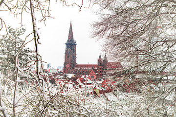 Winter city landscape in Freiburg, Black Forest, Germany. View of the of Minster cathedral.