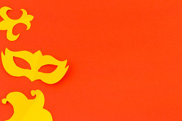 cut out colored paper figures for the holiday Mardi Gras