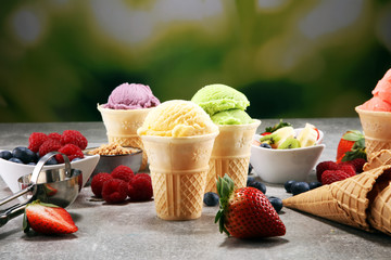 Set of ice cream scoops of different colors and flavours