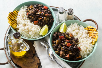 Cuban rice and black bean dish with grilled pineapple. Healthy Vegan Caribbean food for the whole...