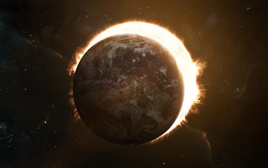 Planet Earth, eclipsing Sun. Solar system. Science fiction art. Elements of the image were...
