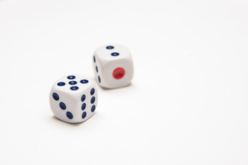 Two playing dice on a white background in the studio