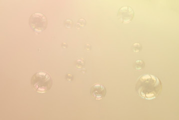 Photo of soap bubbles, creative background, selective focus, toned image