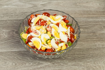 Family Size Salad in Large Bowl with Egg Tomatoes and Cheese and Assorted Greens