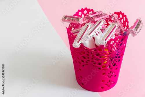 Small Pink Plastic Basket With Several Depilation Blade Stock Photo Small Pink Plastic Basket With Several Depilation Blade