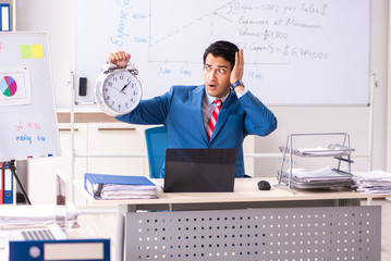 Male sales analyst in front of the whiteboard