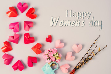 Fototapeta na wymiar Happy International Women’s Day celebrate on March 8, congratulatory CARD. rose-color paper hearts shape figure eight 8