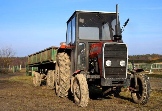 tractor with a trailer on the farm, Poland