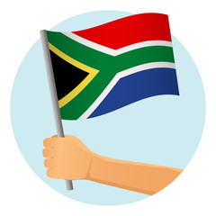 South Africa flag in hand
