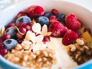 Delicious and healthy breakfast bowl with fruits and nuts