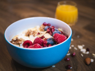 Delicious and healthy breakfast bowl with fruits and nuts