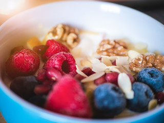 Delicious and healthy breakfast bowl with fruits and nuts