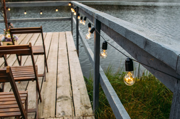 Wedding decorations, retro light garland outdoors