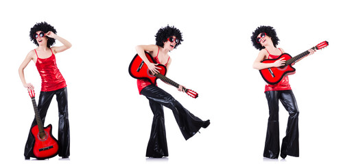 Woman in afro wig playing guitar