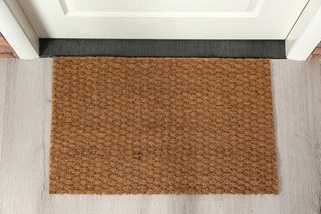 New clean mat near entrance door, top view