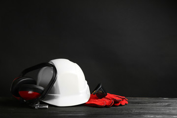 Composition with safety equipment on table. Space for text
