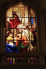 Colorful stained glass inside the Cathedral Duomo in Milan, Italy.