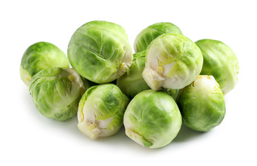 Pile of fresh Brussels sprouts on white background