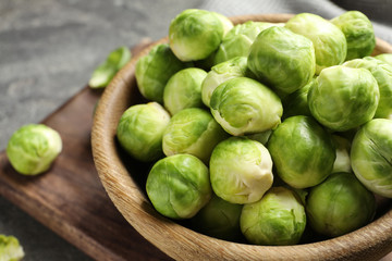 Bowl of Brussels sprouts on table, closeup