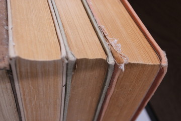old thick books pile paper in library