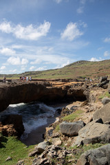 Fototapeta na wymiar Aruba's Natural Bridge and the coastline around it