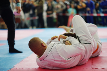 Brazilian Jiu Jitsu BJJ fighters Fighting on The Tournament Competition