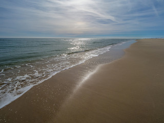 Empty beach after snowfall