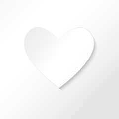 white paper heart on white background